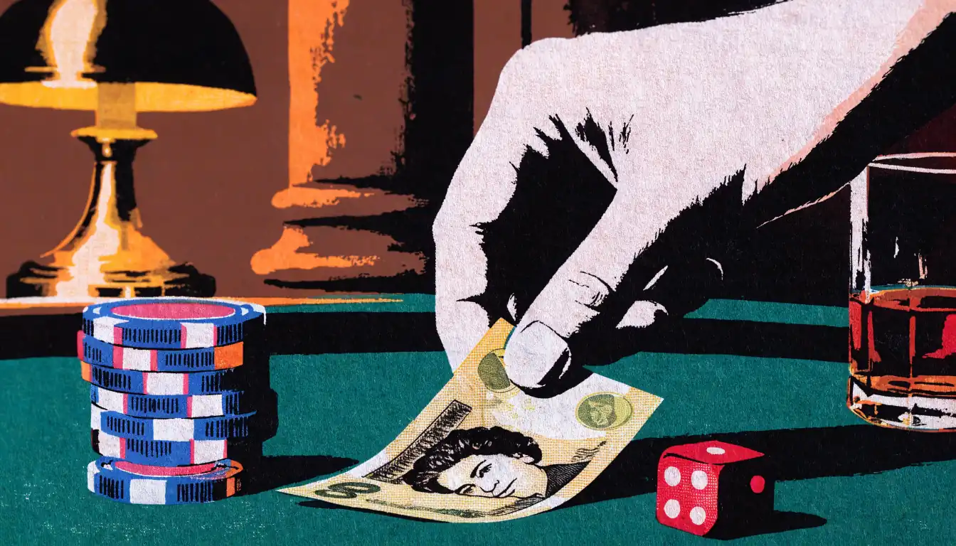 Ten-pound note placed on a casino table with chips and a die